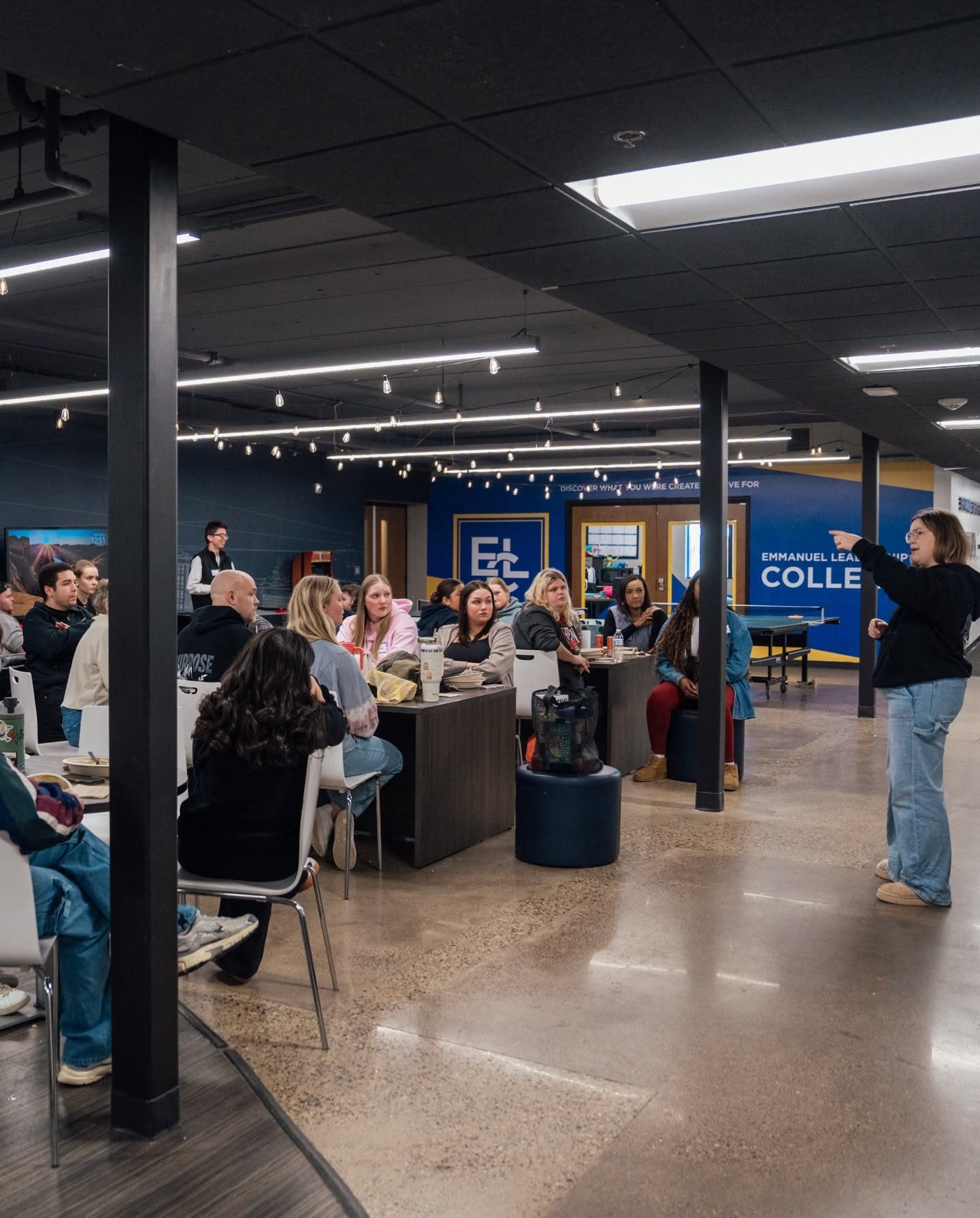 Students gathered inside Emmanuel Leadership College during a session